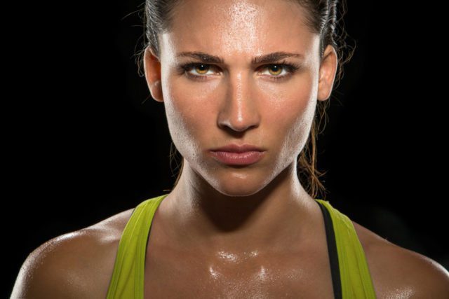 Intense stare eyes determined athlete champion glare headshot powerful